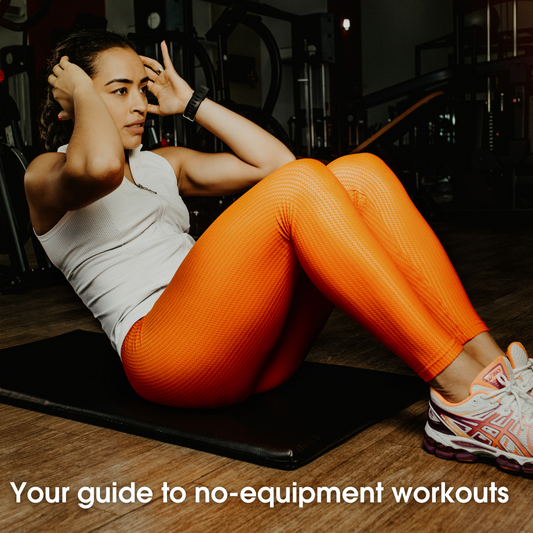 woman in gym doing sit ups exercise mat