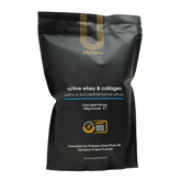 U Perform Active Whey & Collagen in chocolate flavour, packaged in a black pouch with gold branding. This high-protein supplement combines whey protein and collagen peptides to support muscle growth, recovery, joint health, and overall performance. Formulated for active individuals, it is Informed-Sport certified, ensuring it is tested for banned substances.