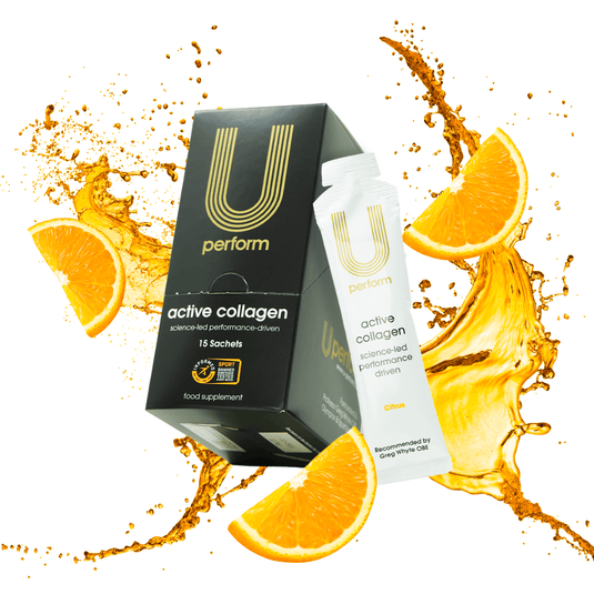 U Perform Active Collagen (Citrus Flavour) box and sachet in black, gold, and white packaging, surrounded by splashes of liquid and fresh orange slices. A science-led liquid collagen supplement designed to support performance, recovery, and joint health. Informed-Sport certified and recommended by Professor Greg Whyte OBE.